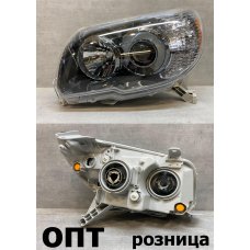 TY05-1201D-L (312-1193)* TOYOTA HILUX SURF 2005-09, ФАРА L (Китай) 2м.Линза Темная